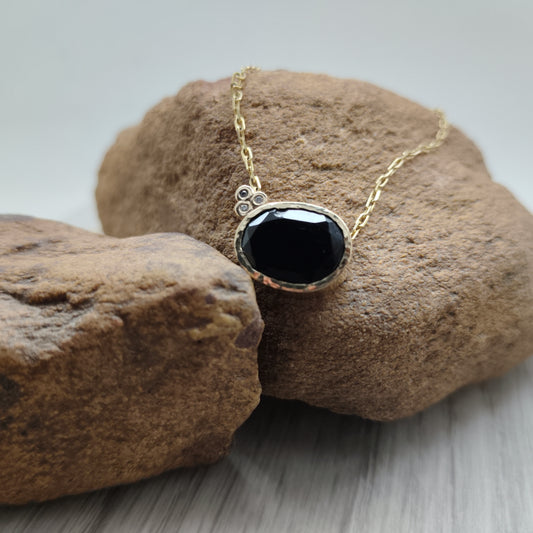 Flat Cut Black Spinel Pendant with Diamond Accents in 9ct Gold